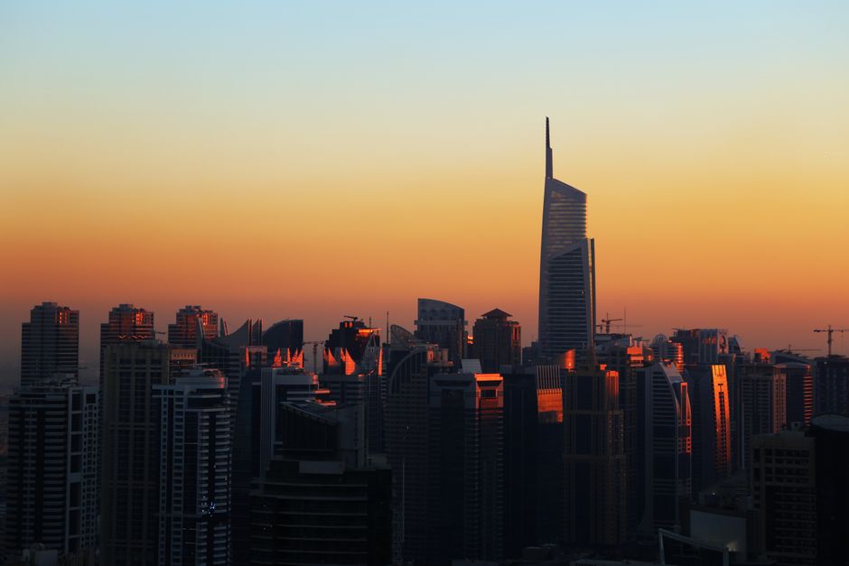 Captivating view of Dubai's skyline at sunset, highlighting modern skyscrapers and architectural marvels.